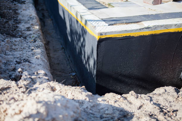 Professional Waterproofing technician working in Oakland, TN